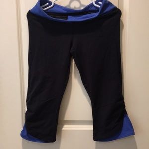 Athleta womens capri Leggings flair bottom inner pouch size SP black blue